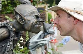 Sculptor David Goode locks eyeballs with a gnome on his stand at the Chelsea Flower Show. Sculptor David Goode locks eyeballs with a bronze gnome on his ... - news-graphics-2007-_635893a