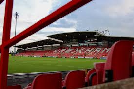 Crucial League One Clash: Wrexham Host Burton Albion Amid Promotion Push