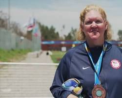 Image of athlete winning the women's individual compound open