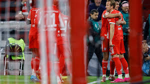 Kane strikes again as Bayern beat Dortmund to stay clear in Bundesliga