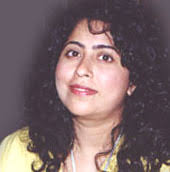 Anitha Nair A giant avocado tree frames the living room window in novelist Anita Nair&#39;s house as she ... - anita1