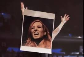 Becky Lynch Tapes Her Face Over CM Punk Portrait At Madison Square Garden