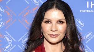 Catherine Zeta-Jones showcases incredibly toned figure in tiny mini dress 
that sparks reaction from stepson