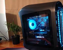 gamers playing together while using the powerful Alienware Aurora R14 Liquid Cooled Gaming Desktop