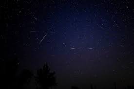 Perseid meteor shower streaking across the night sky