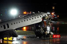 Damaged Air Canada Express jet after collision with a fire truck at LaGuardia Airport