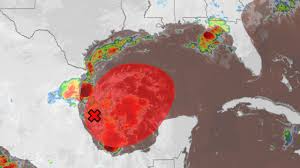 Gulf Coast hurricane watch 2026 showing Tropical Storm Isaias forming in the Gulf of Mexico near coastal high-rises