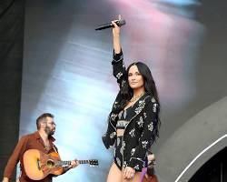Image of Kacey Musgraves performing live on stage