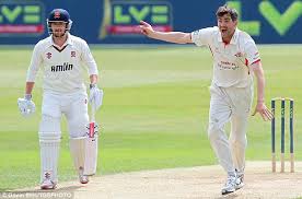 <b>Kyle Hogg</b> of Lancashire celebrates the wicket of Owais Shah - article-2341734-1A52384F000005DC-309_634x419