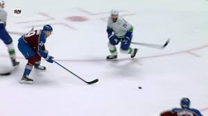 MacKinnon's Two Goals Propel Avalanche to Victory Over Canucks