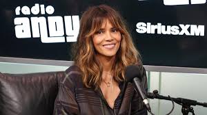 Halle Berry's Bold Fashion Choices: Sheer Robe and Shredded Dress