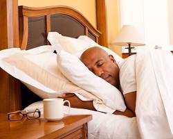 Image of Person sleeping in bed