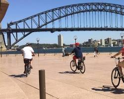 person riding a bike on the Sydney Harbour Bridge