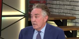 Longtime journalist killed in freak accident after tires fall off tractor-trailer