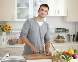 Image of man is cooking in a kitchen