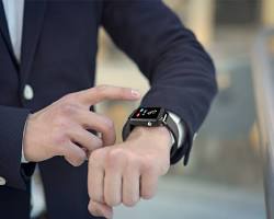 Image of person wearing a smartwatch with a stylish design