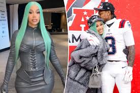 Cardi B laces up in head-to-toe leather to support boyfriend Stefon Diggs at Patriots playoff game