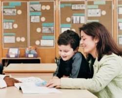 Image of Parent and Teacher talking