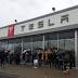 People are waiting in line to reserve Tesla's Model 3 sight unseen