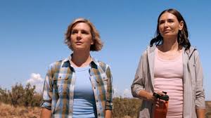 ‘Pluribus’ Cast, Creator Unpack Zosia & Carol’s First Kiss, Budding Romance: “Is It True Love, Or Is It Artifice?”