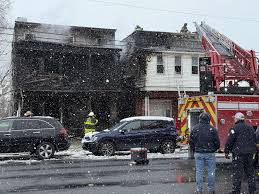 Woman rescued from Western Avenue fire dies from injuries