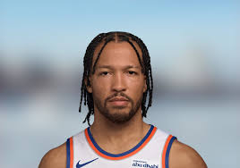 Jalen Brunson headed to the locker room after doing …