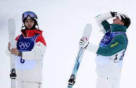 Cooper Woods wins men’s freeski moguls gold, denying Mikaël Kingsbury via tiebreak