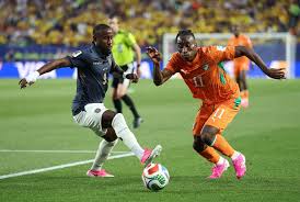 why are some of the players wearing pink cleats at the world cup?
