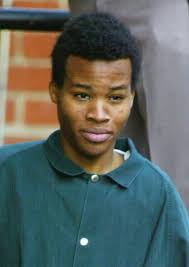 Accused sniper John Lee Malvo walks out of the Fairfax County Juvenile Court House after appearing ... - 085-1649690MW002_ADULT1-383x540