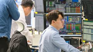 FTSE 100 index hits 10,000 milestone in new year rally