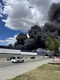 Salt Lake City fire crews battle large fire on Orange Street