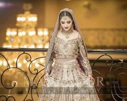 Image of Pakistani bridal lehenga gold