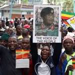 Zimbabwe ex-army boss sworn Mugabe