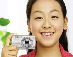 Mao Asada shows off the new camera for Olympus Mao Asada was a phenomenon last winter, coming from relative obscurity to win the ISU (International Skating ... - asada-mao-olympus