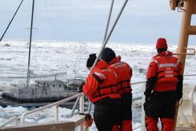 The Healy broke through Arctic ice to reach the S/V Altan Girl near Barrow ...