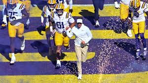 News Journal graphic depicting a gavel and football helmets representing the legal battle between LSU and the SEC.