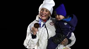 Kaillie Humphries celebrates winning Olympic bronze