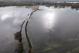 More than 80 flood warnings issued in UK with more downpours forecast