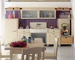 تصویر kitchen with cream cabinets and purple accents