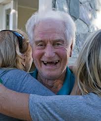 IN THE SWIM: Martin Coffey receives a $2.5m hug from supporters after hearing that the Edgeware Pool project is to go ahead. - 3509205