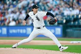 Chicago White Sox starting pitcher Davis Martin (65) delivers a pitch against the New York Yankees during the first inning at Rate Field in Chicago, Illinois.