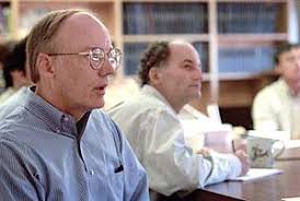 At a weekly conference, Dr. Catterall and Dr. Todd Scheuer listen to a presentation by a member of their research group. - ion7