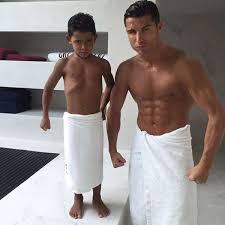 Image result for PIC OF RONALDO WITH HIS SON/MESSI WITH HIS SON