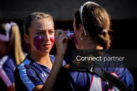 Licensable picture: Fitch’s Miauna Jorge (21) applies face paint to Fitch’s Morgan Roby (42) before an OHSAA DI state semifinal softball game