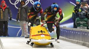 Germans sit 1-2-3, U.S. 4th midway through 2-man bobsled action