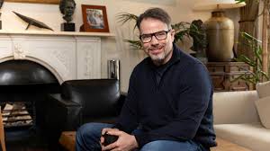 Chris Rokos: UK's third-biggest taxpayer to leave for Greece — BBC