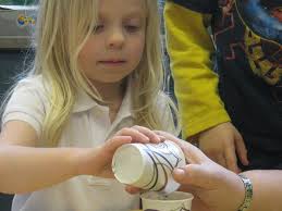 The Kids are in the Garden! Seed, Grow and Learn in the Edible Garden - kid-planting-seedlings