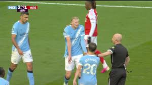 Fuming Erling Haaland has SLEEVE ripped off by Arsenal ace Gabriel but doesn't even get given a free kick