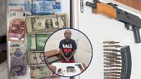 Businessman arrested after discovery of millions in foreign & local currency, illegal AK-47 rifle & ammo