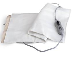 Image of Person with arthritis holding a heating pad